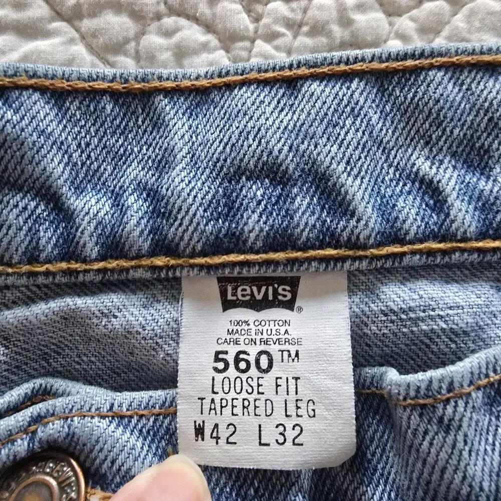 Vintage 90s made in USA Levi's 560 loose fit tapered leg Jeans 42w 32L Blue